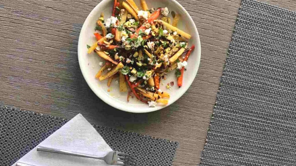 honey roasted carrots and parsnips on table